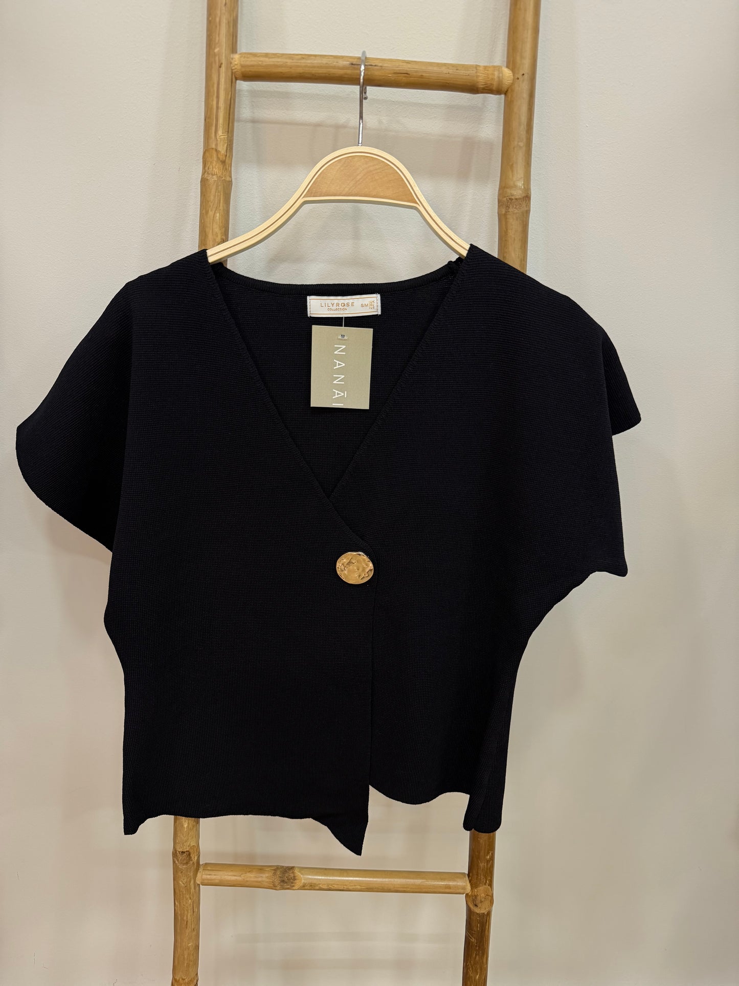 Chaleco botón dorado